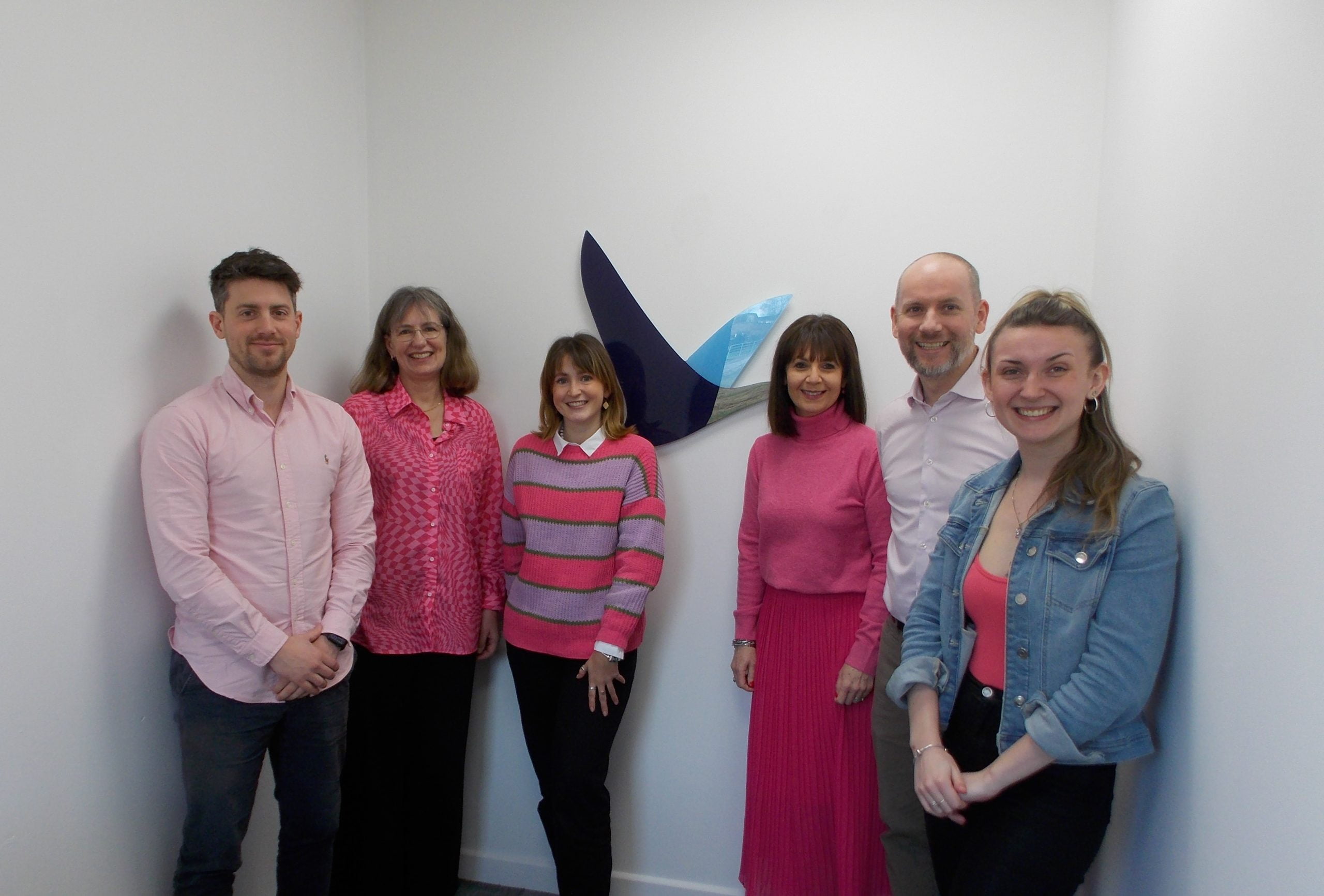International Women's Day - The team at Cross Border Financial Planning wearing pink to celebrate International Women's Day