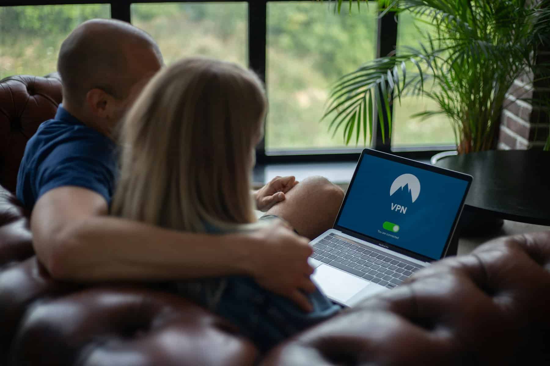 Privacy Policy - CBFP UK - Image of couple with a secure laptop - VPN